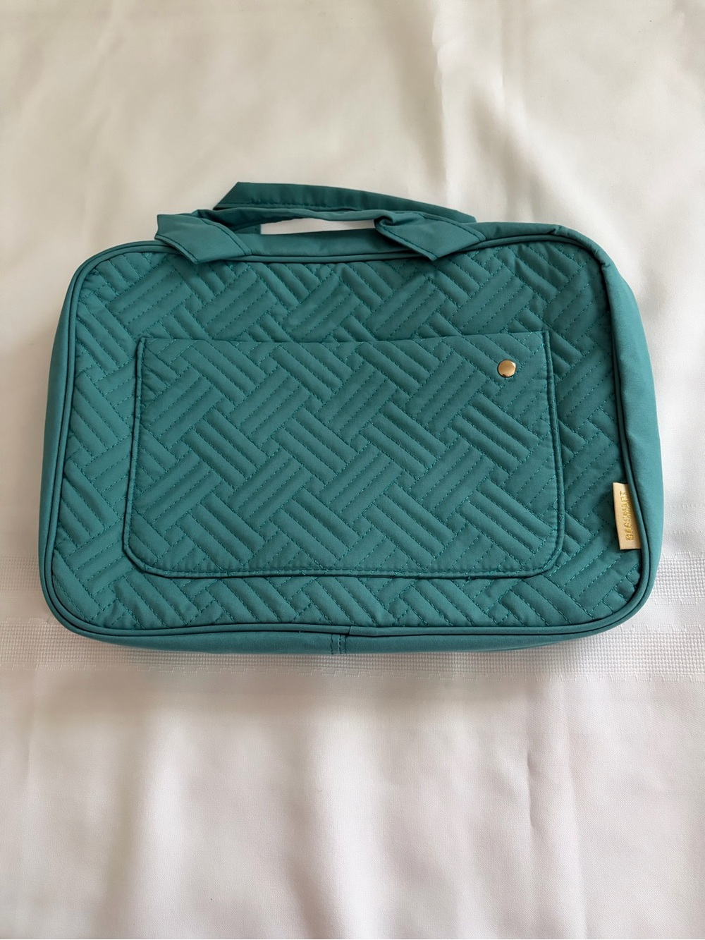 Quilted Teal Toiletries Bag by Bagsmart.
